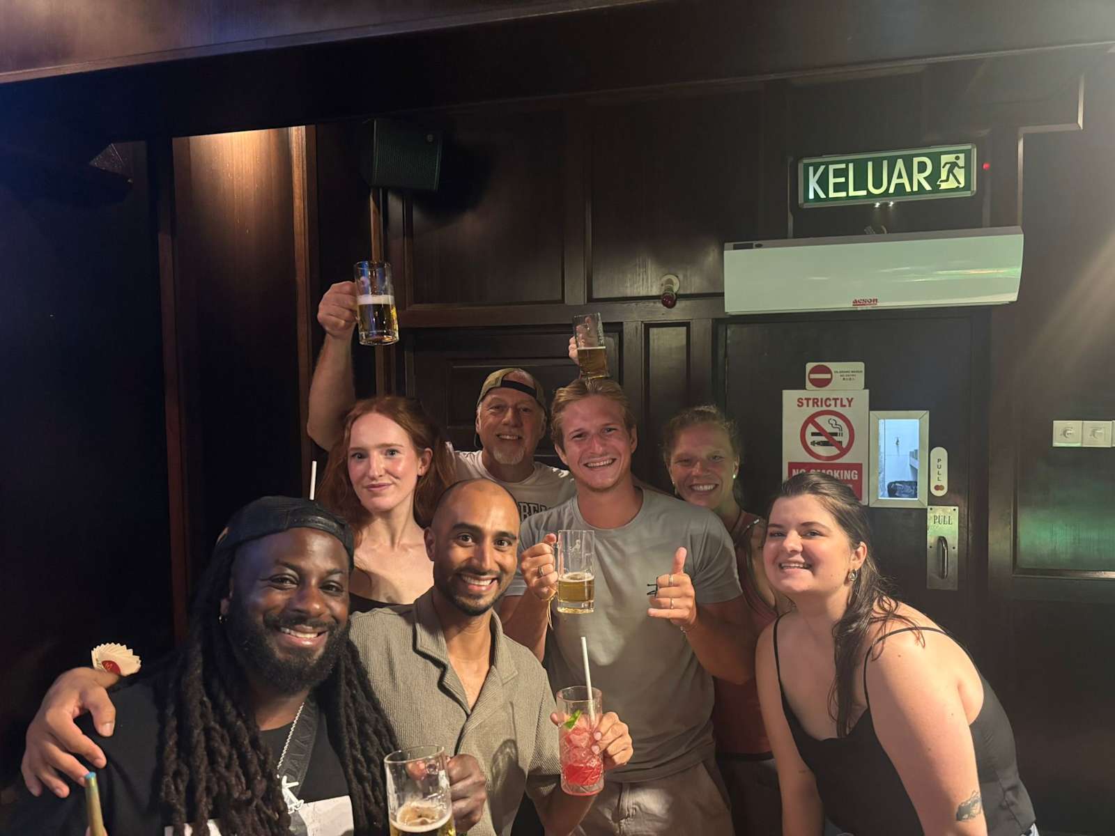 Travelers toasting in a friendly social setting