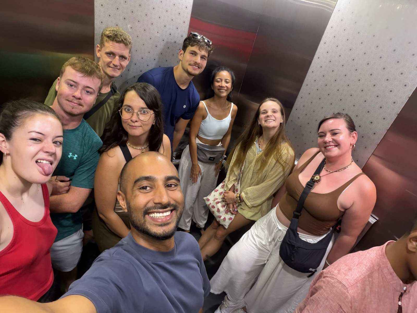 Group selfie in the Crest Residence elevator